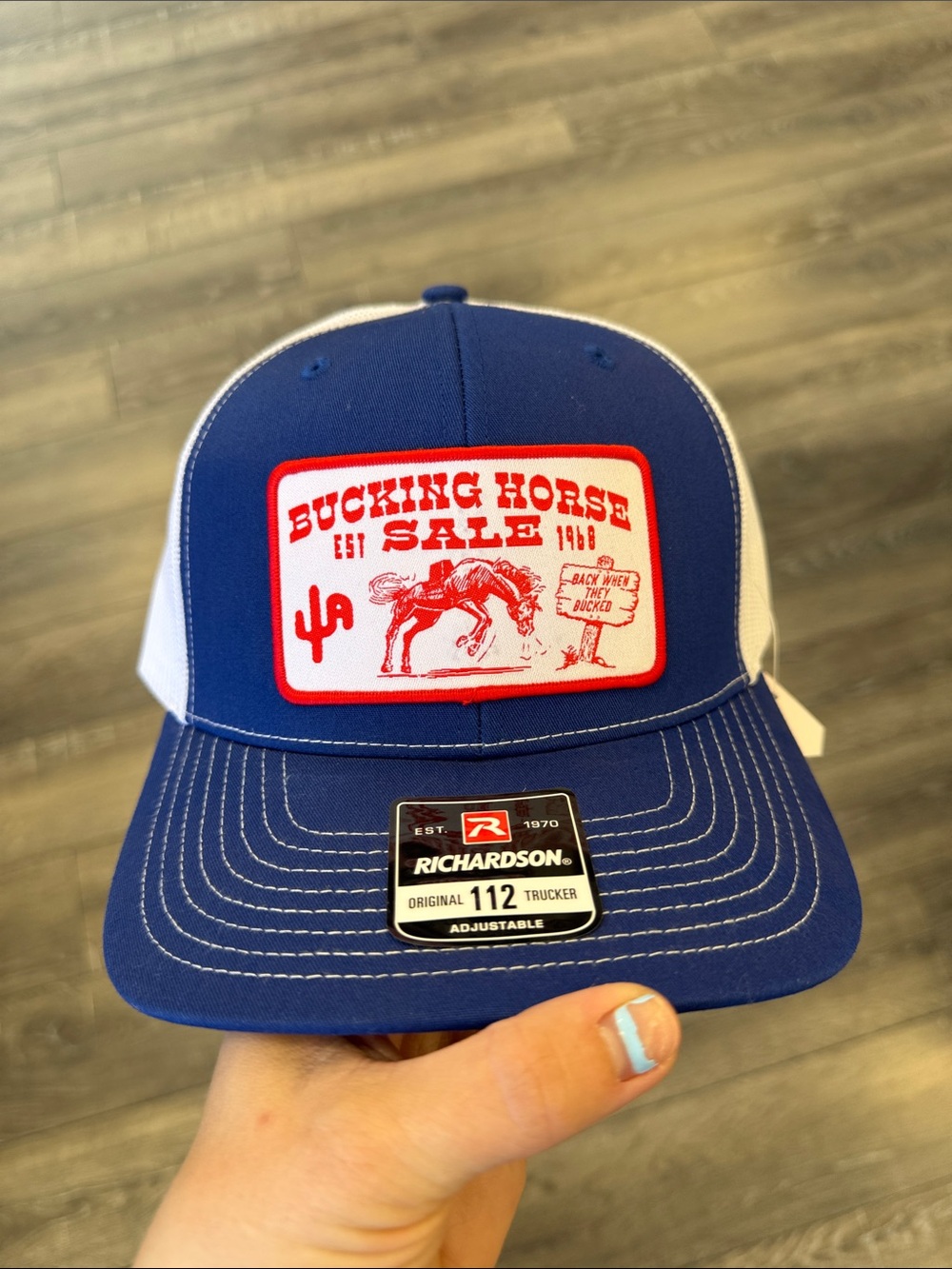 Blue and White 'Bucking Horse Sale' Trucker Hat